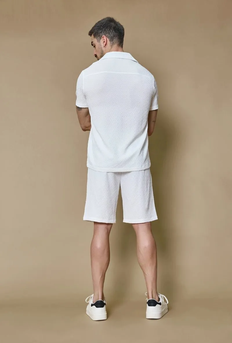 Ensemble uni chemise manches courtes short à motifs géométriques