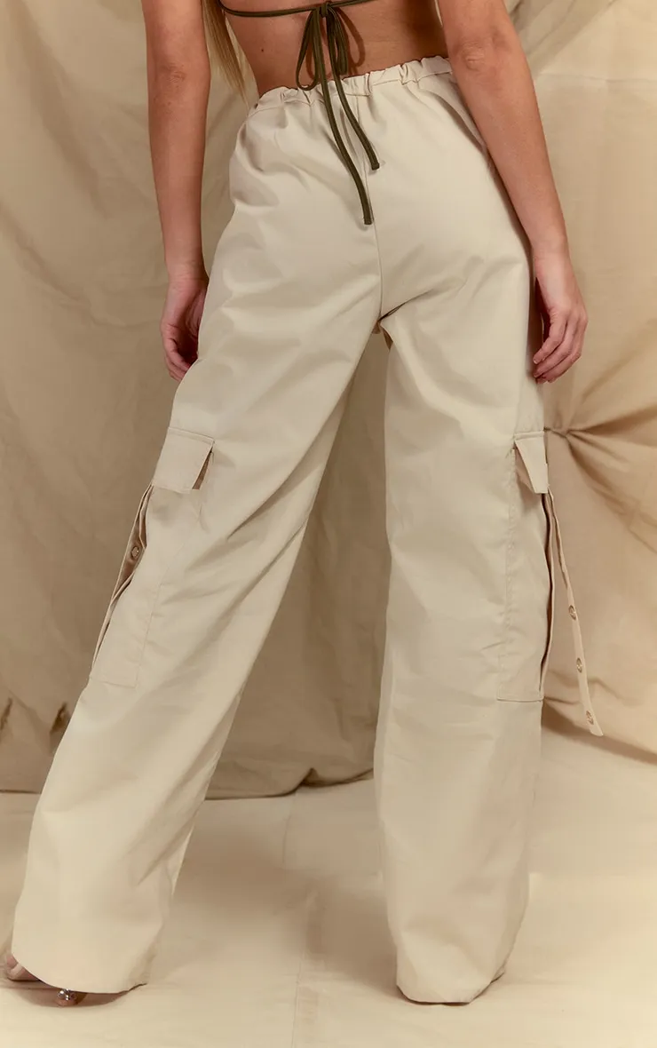 Pantalon cargo crème à anneaux et cordons ajustables