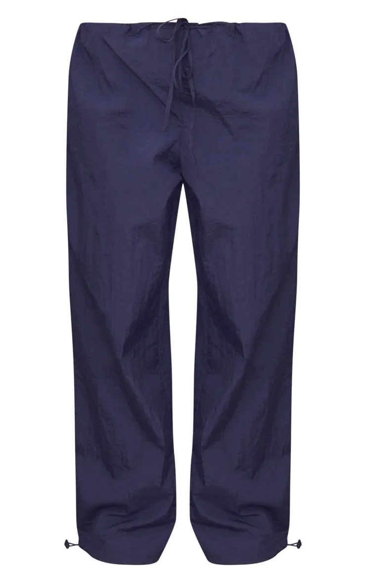 Pantalon cargo léger bleu marine style parachute à cordons ajustables