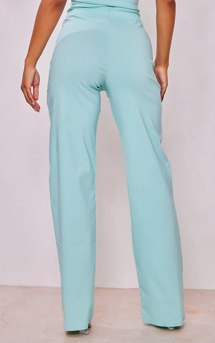 Pantalon cargo tissé stretch turquoise à taille basse