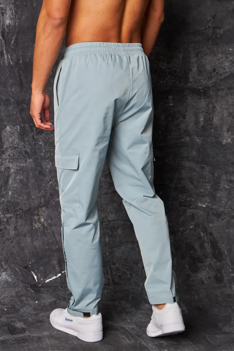 Pantalon de jogging cargo à boutons pressions gris bleuté